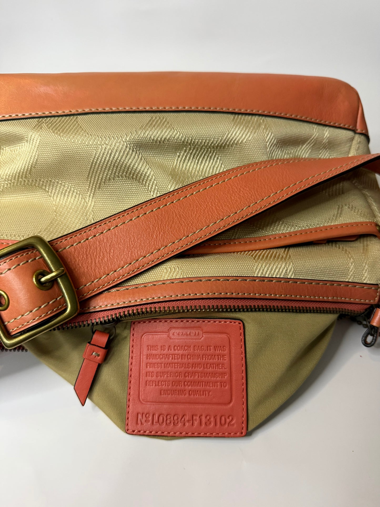 Coach Turnlock Twin Pocket in Peach