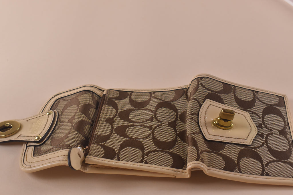 Coach Signature Turnlock Trifold Wallet