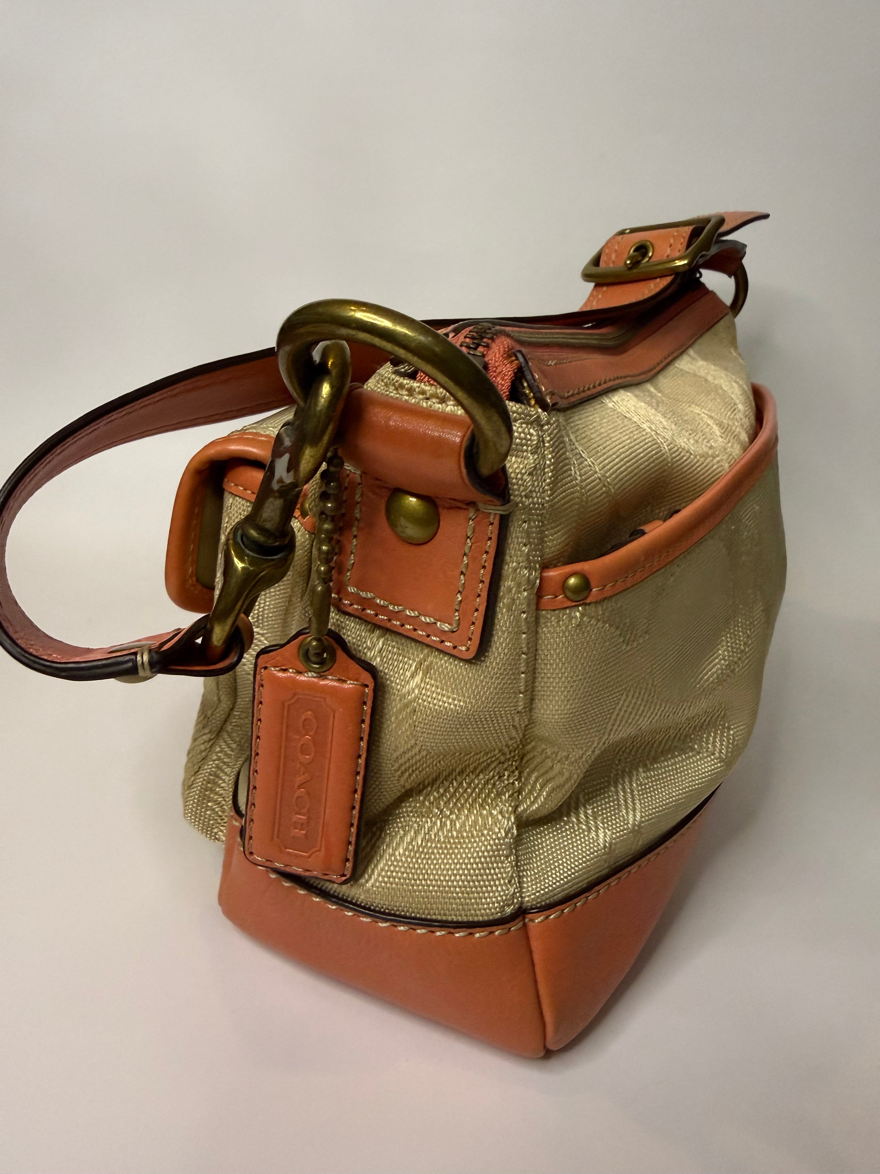 Coach Turnlock Twin Pocket in Peach